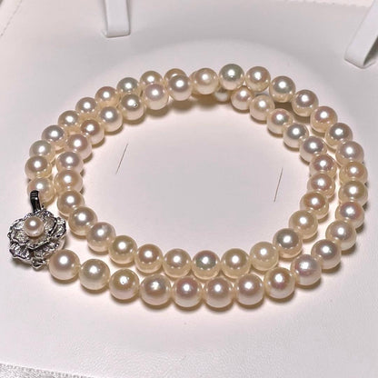 Akoya pearl semi-round pearl necklace with 6.4-7.0mm white pearls on silver chain, 42.8 cm length