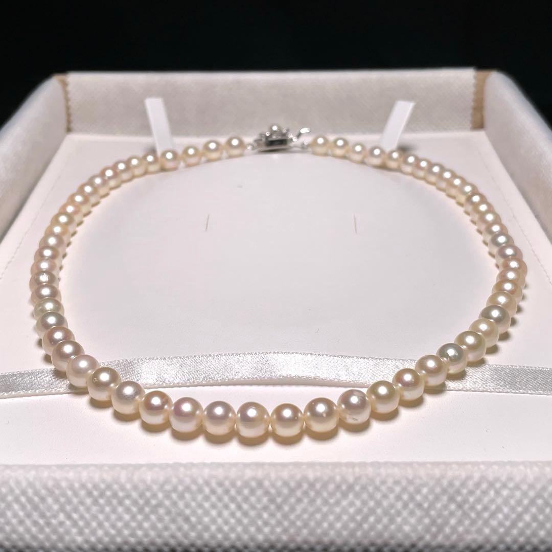 Akoya pearl semi-round pearl necklace with 6.4-7.0mm white pearls on silver chain, 42.8 cm length