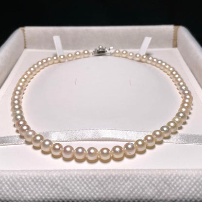 Akoya pearl semi-round pearl necklace with 6.4-7.0mm white pearls on silver chain, 42.8 cm length