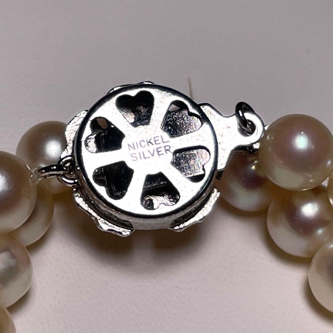 Akoya pearl semi-round pearl necklace with 6.4-7.0mm white pearls on silver chain, 42.8 cm length