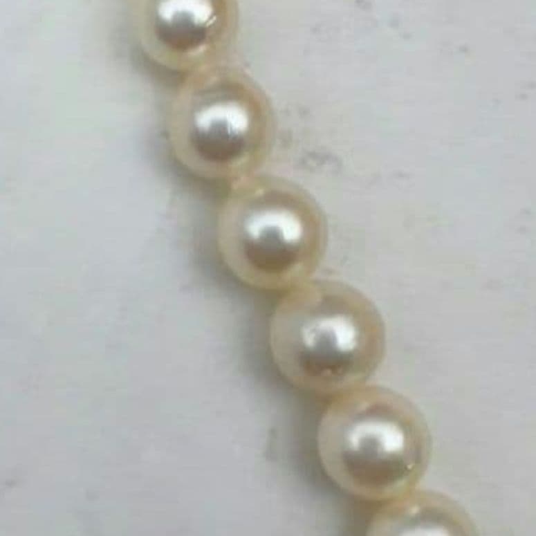 Mikimoto baroque pearl necklace with 6.6-6.8mm pearls and silver clasp, 54cm length, re-threaded in 2024