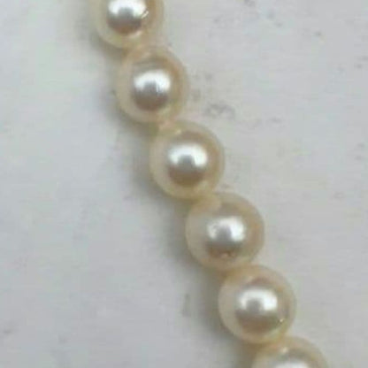 Mikimoto baroque pearl necklace with 6.6-6.8mm pearls and silver clasp, 54cm length, re-threaded in 2024