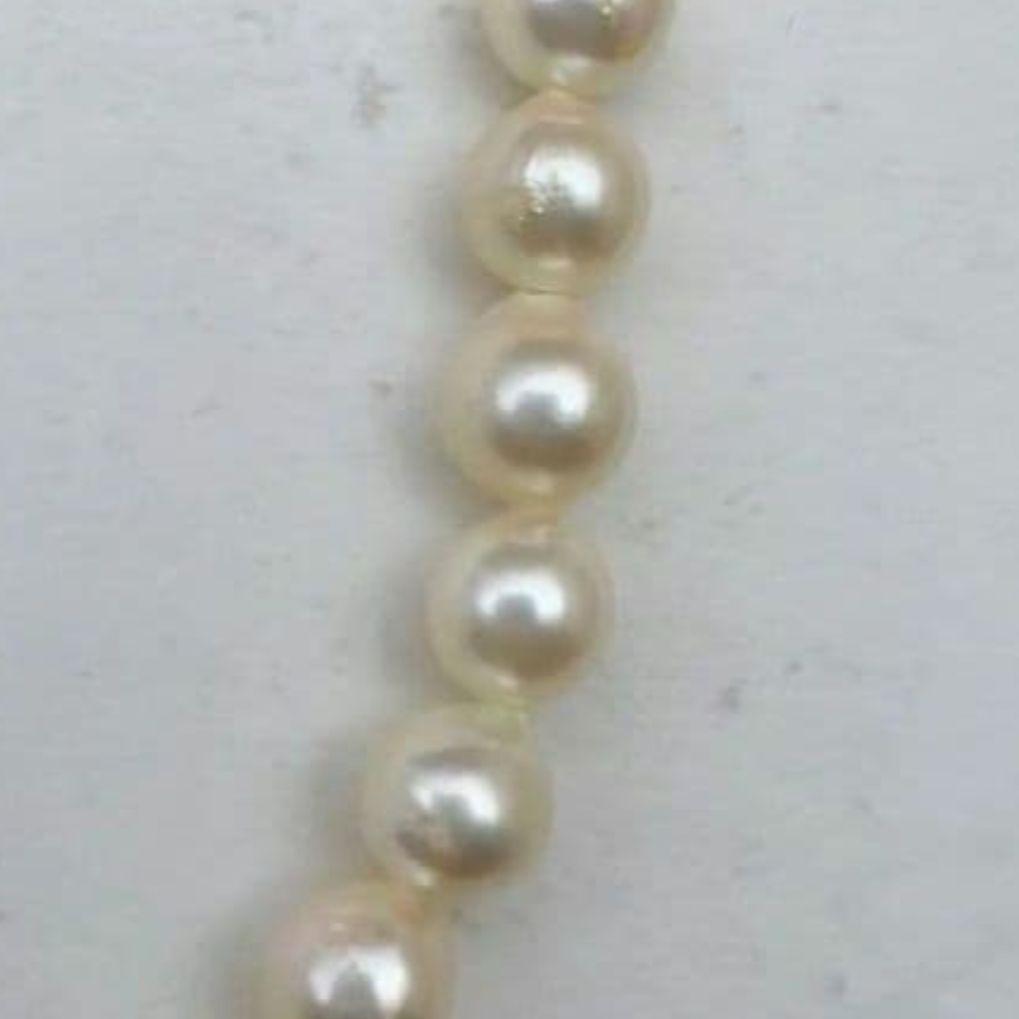 Mikimoto baroque pearl necklace with 6.6-6.8mm pearls and silver clasp, 54cm length, re-threaded in 2024