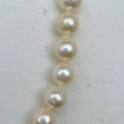 Mikimoto baroque pearl necklace with 6.6-6.8mm pearls and silver clasp, 54cm length, re-threaded in 2024