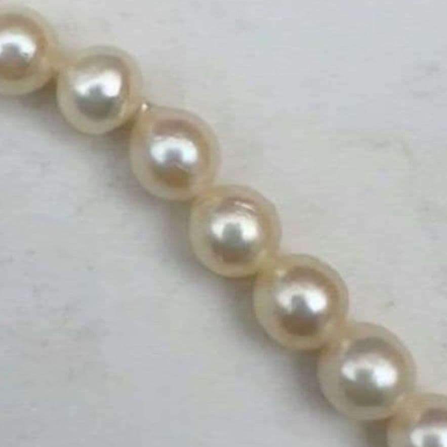 Mikimoto baroque pearl necklace with 6.6-6.8mm pearls and silver clasp, 54cm length, re-threaded in 2024