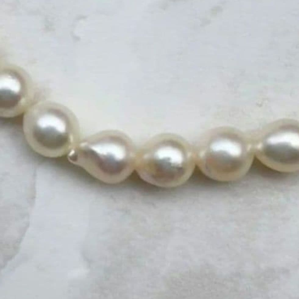 Mikimoto baroque pearl necklace with 6.6-6.8mm pearls and silver clasp, 54cm length, re-threaded in 2024