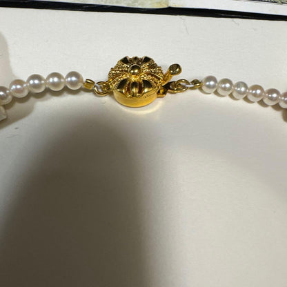 Pure Akoya pearl necklace with 3.5mm to 7.2mm pearls set in 14K gold chain