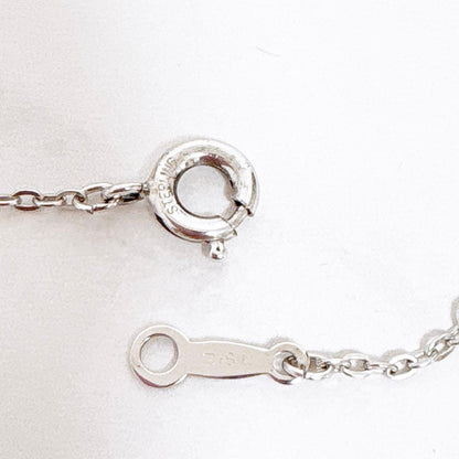 Mikimoto silver necklace featuring a 6mm Akoya pearl pendant measuring 3.1 cm by 1.8 cm on a 40.2 cm chain