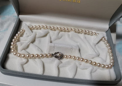 Tasaki Pearl Necklace 42 cm length with round 6.5 to 7 mm white pearls on a delicate string