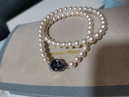 Tasaki Pearl Necklace 42 cm length with round 6.5 to 7 mm white pearls on a delicate string