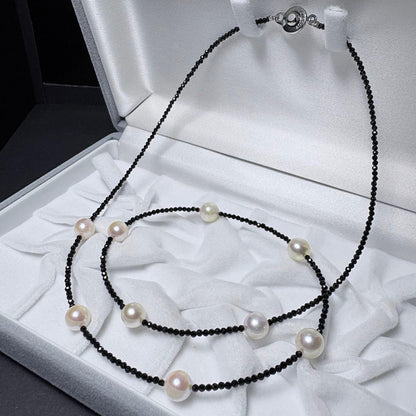 Akoya pearl and black spinel necklace with nine 8.1mm pearl beads on a 59cm chain