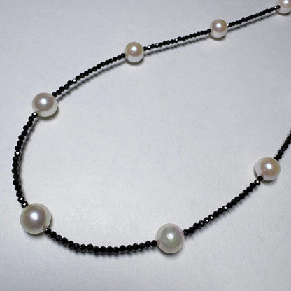 Akoya pearl and black spinel necklace with nine 8.1mm pearl beads on a 59cm chain