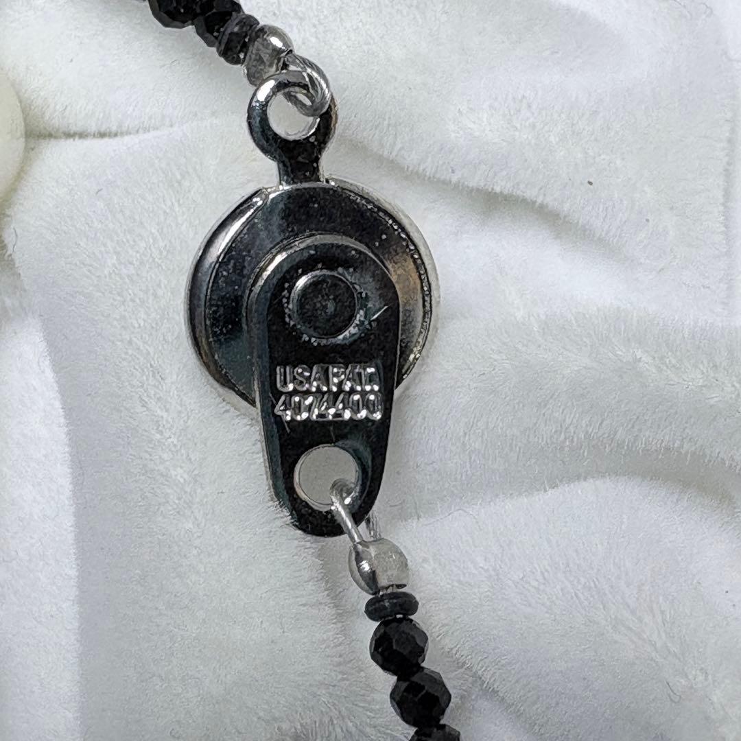Akoya pearl and black spinel necklace with nine 8.1mm pearl beads on a 59cm chain