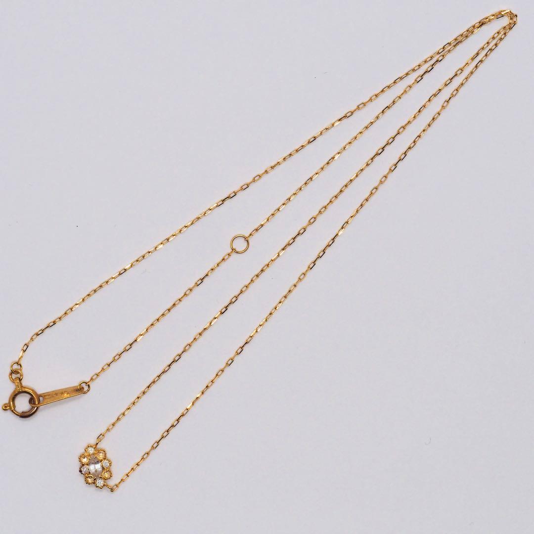 Close-up of ageteK18YG 0.05ct diamond necklace with 40cm adjustable azuki chain in yellow gold