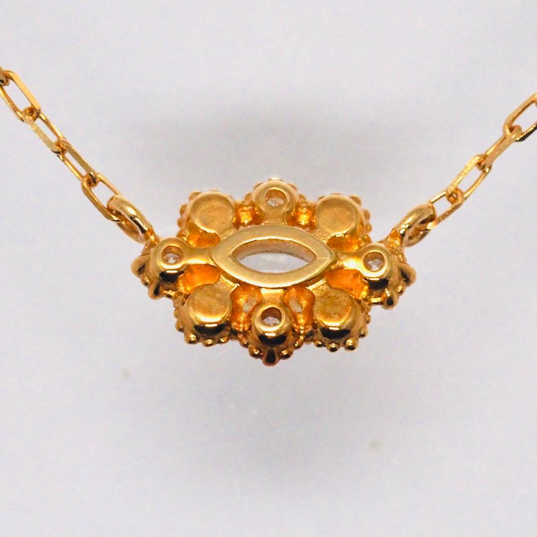 Close-up of ageteK18YG 0.05ct diamond necklace with 40cm adjustable azuki chain in yellow gold