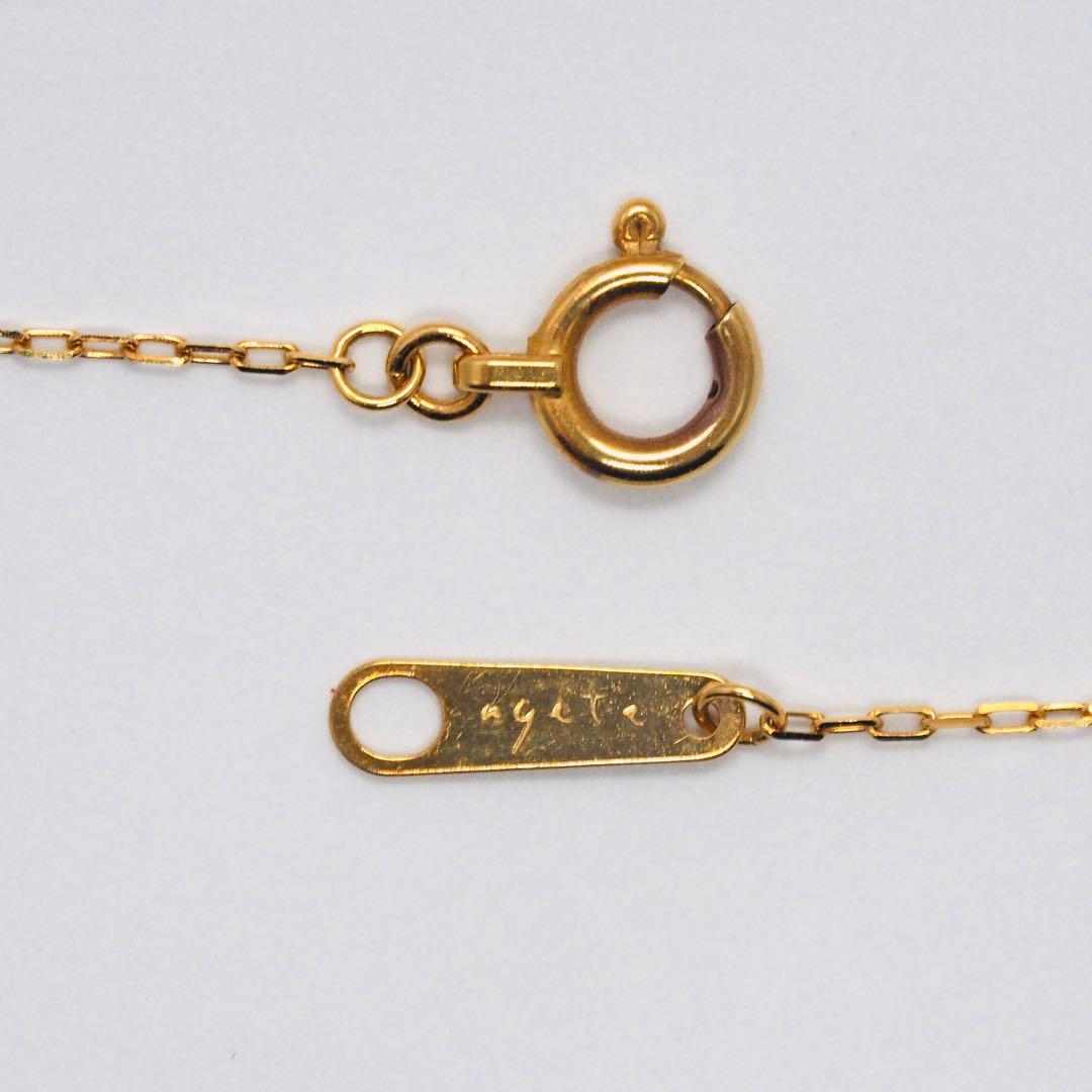 Close-up of ageteK18YG 0.05ct diamond necklace with 40cm adjustable azuki chain in yellow gold