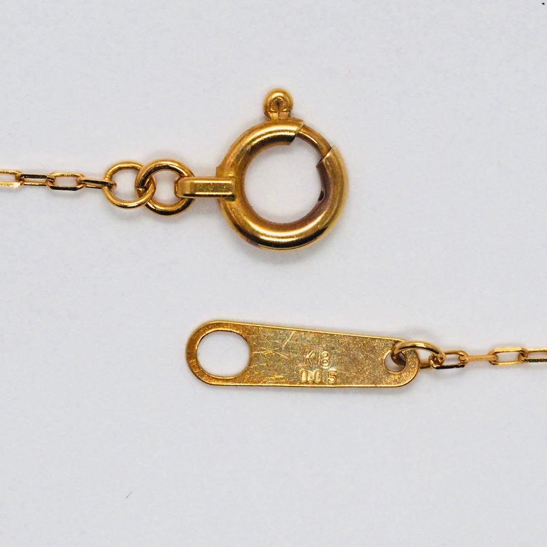 Close-up of ageteK18YG 0.05ct diamond necklace with 40cm adjustable azuki chain in yellow gold