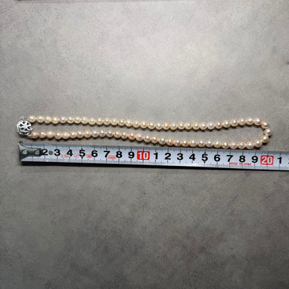 Akoya pearl necklace with 5.9mm to 6.3mm white pearls and silver hallmark clasp, 41.5cm length
