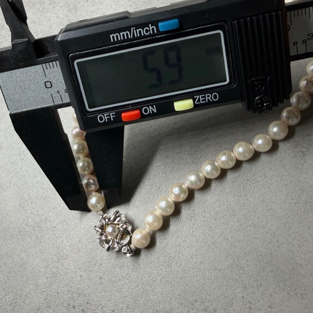 Akoya pearl necklace with 5.9mm to 6.3mm white pearls and silver hallmark clasp, 41.5cm length