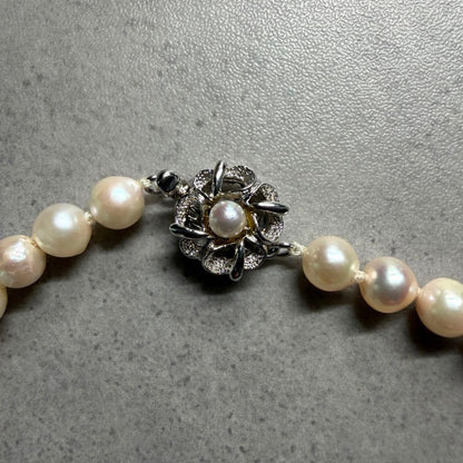 Akoya pearl necklace with 5.9mm to 6.3mm white pearls and silver hallmark clasp, 41.5cm length