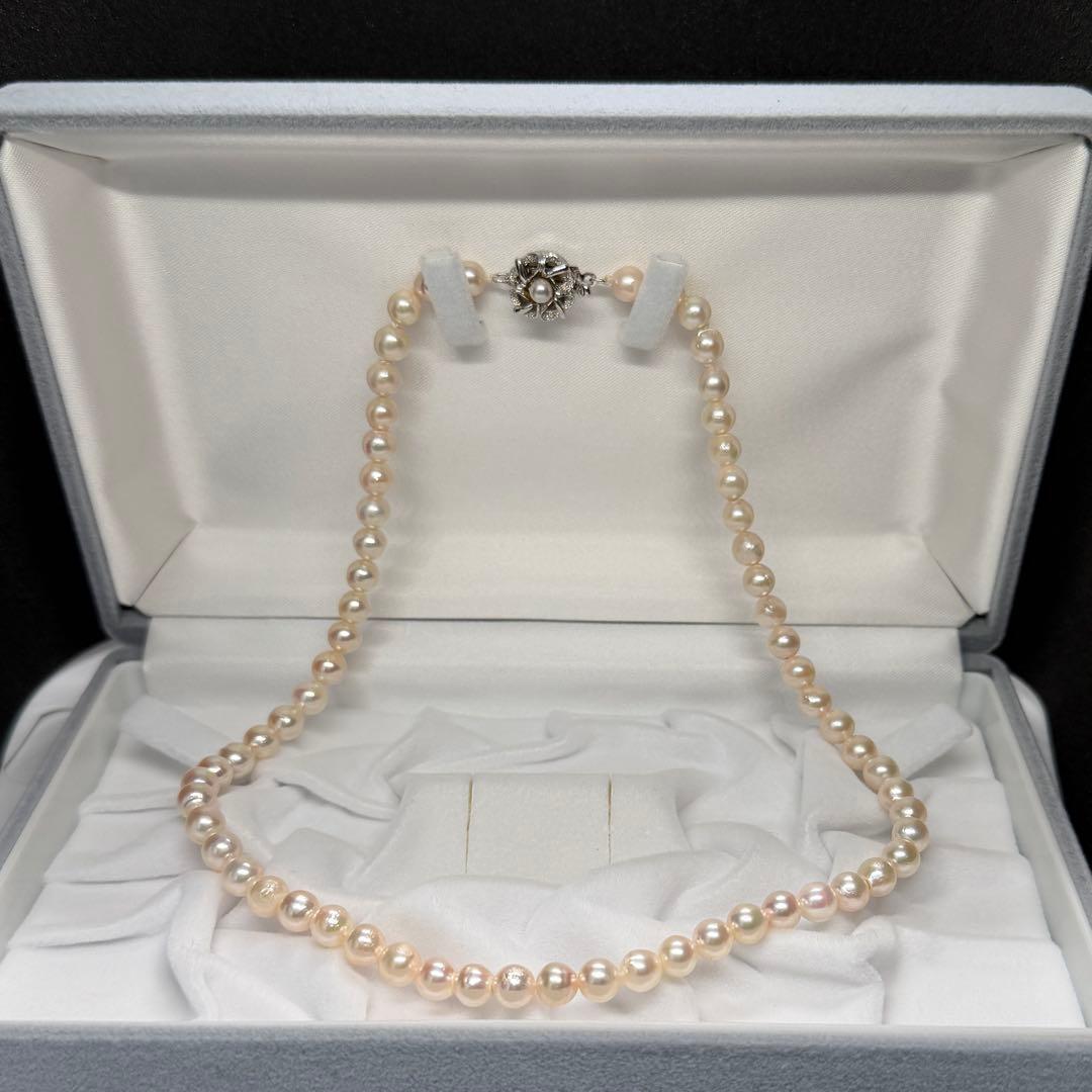 Akoya pearl necklace with 5.9mm to 6.3mm white pearls and silver hallmark clasp, 41.5cm length