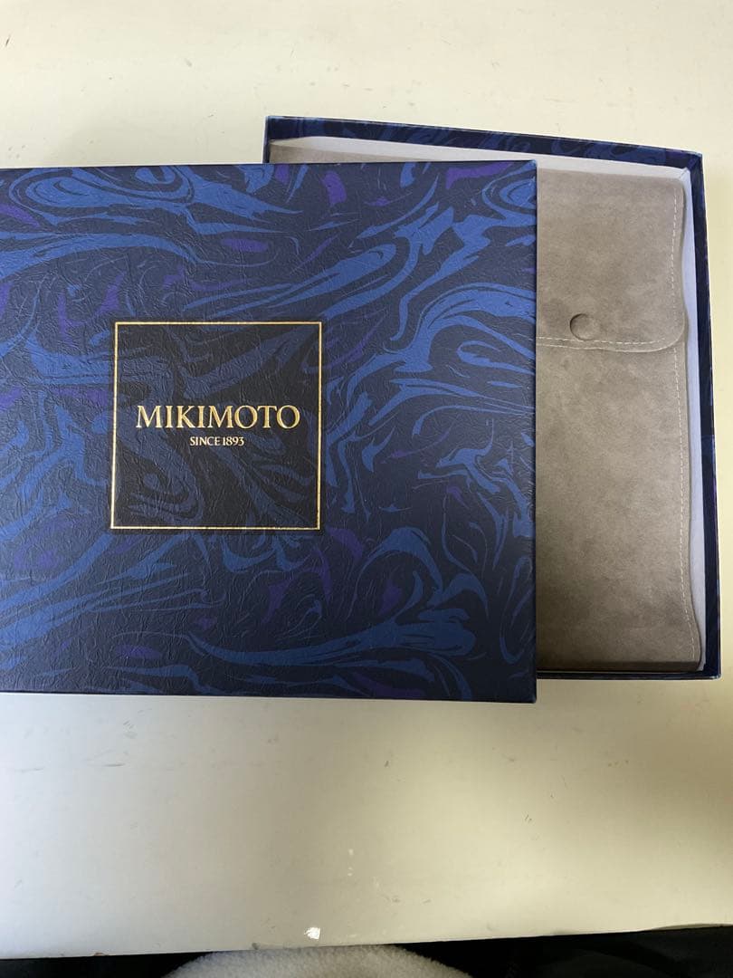 Mikimoto pearl necklace with 57 round pearls sized 7 to 7.5 mm on a 43 cm strand