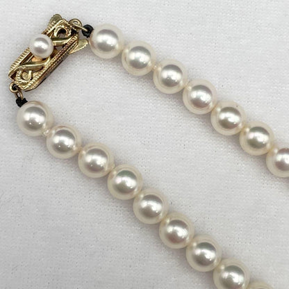 Mikimoto Akoya Pearl Necklace with 6.5mm-7.0mm white pearls and K14 clasp, 38cm length