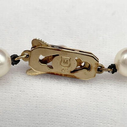 Mikimoto Akoya Pearl Necklace with 6.5mm-7.0mm white pearls and K14 clasp, 38cm length