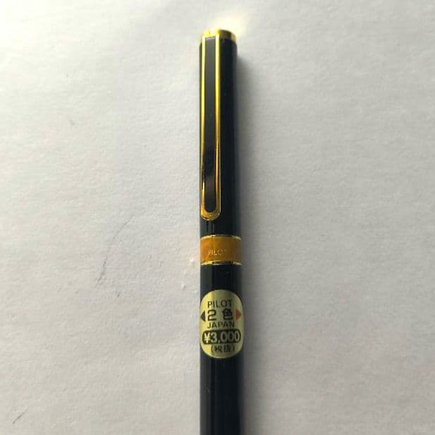 PILOT two-color ballpoint pen with dual ink colors, unused but stored long-term, requiring refill