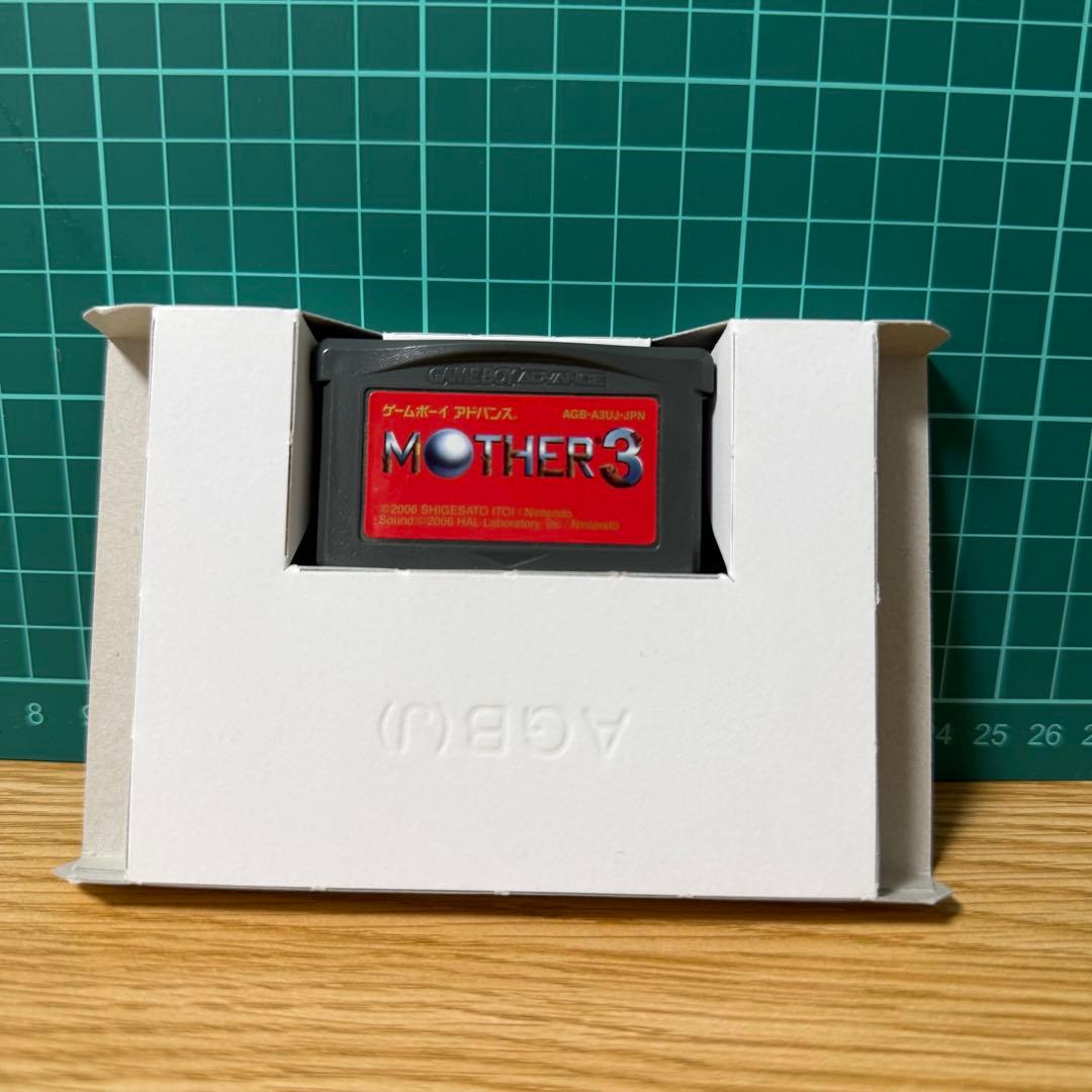 Mother 3 Game Boy Advance game cartridge with manual and booklet in clean condition