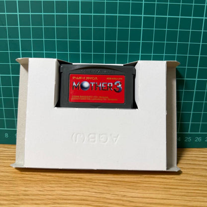 Mother 3 Game Boy Advance game cartridge with manual and booklet in clean condition
