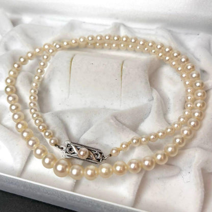 MIKIMOTO Pearl Gradient Necklace featuring genuine pearls 3.9-7.2 mm with silver fittings on a 43 cm chain