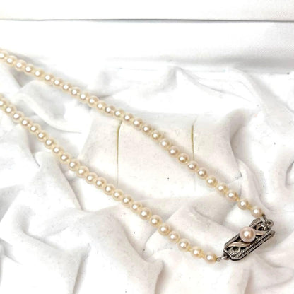 MIKIMOTO Pearl Gradient Necklace featuring genuine pearls 3.9-7.2 mm with silver fittings on a 43 cm chain