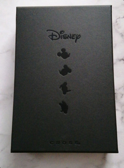 Red Cross Disney Limited Sentiment rotating ballpoint pen with 4 charms and black carrying case