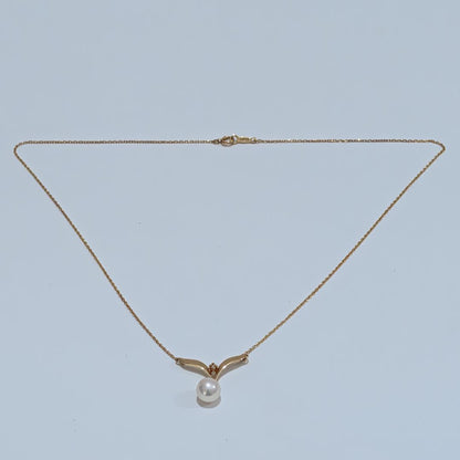 Mikimoto pearl diamond necklace with 7.2mm pearl pendant set in 18K yellow gold on 40 cm chain