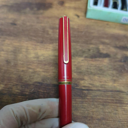 Pilot Fountain Pen Red with 14K gold nib and red cap showing slight wear on cap ring and nib base