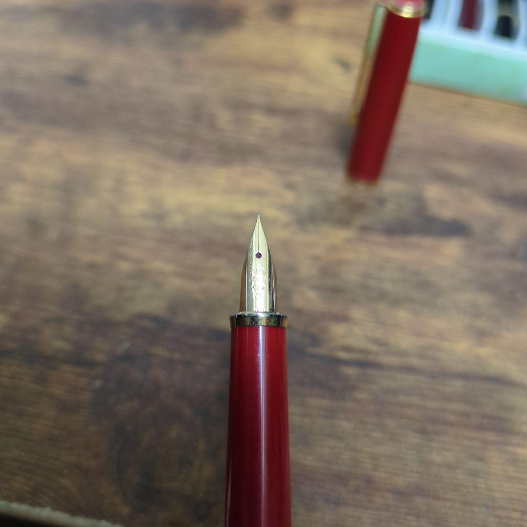Pilot Fountain Pen Red with 14K gold nib and red cap showing slight wear on cap ring and nib base