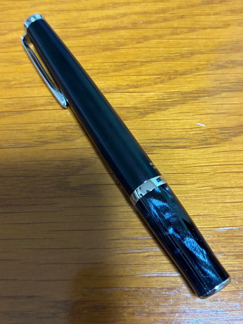 PILOT TIMELINE black ballpoint pen with marble pattern grip shown on white background