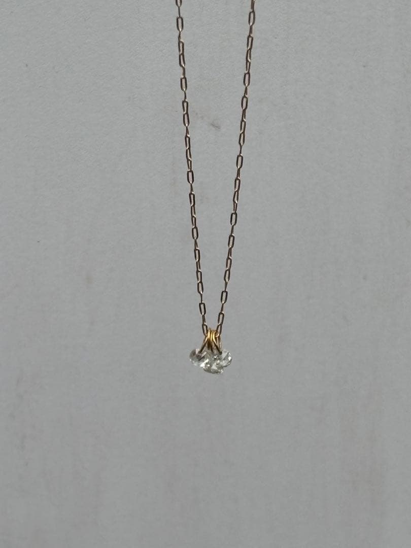 Agete diamond necklace 18K gold with a 70 cm long chain displayed on a white background