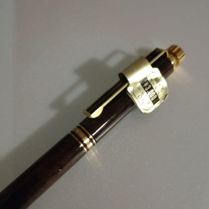 Discontinued Pilot Switch Marble Brown multi-function pen with metal material and gold decoration