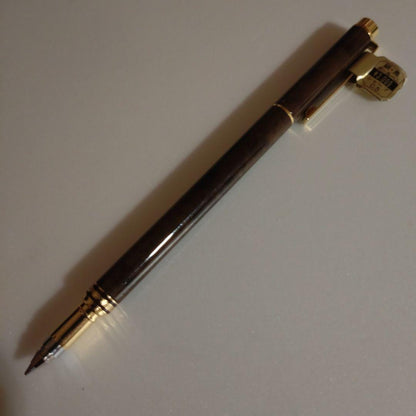 Discontinued Pilot Switch Marble Brown multi-function pen with metal material and gold decoration