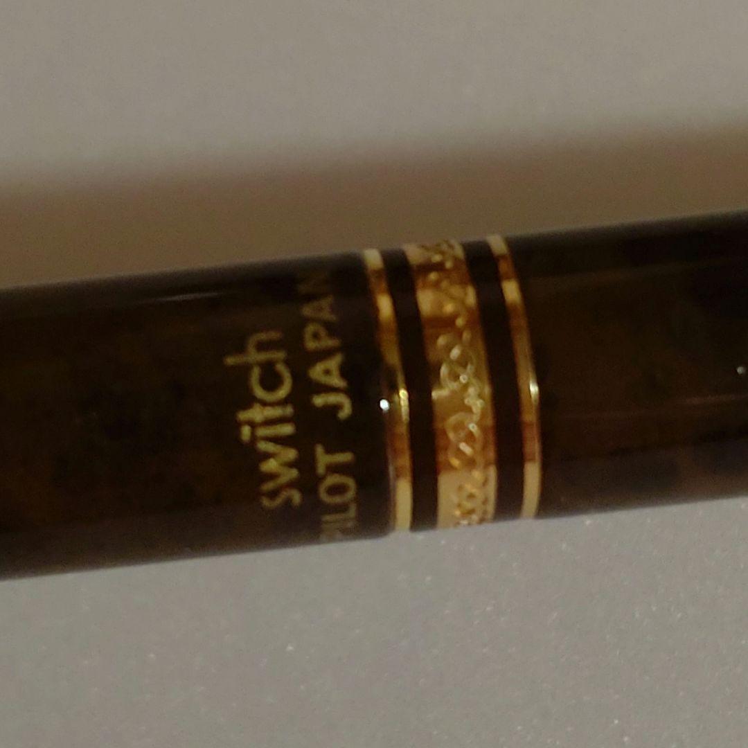 Discontinued Pilot Switch Marble Brown multi-function pen with metal material and gold decoration