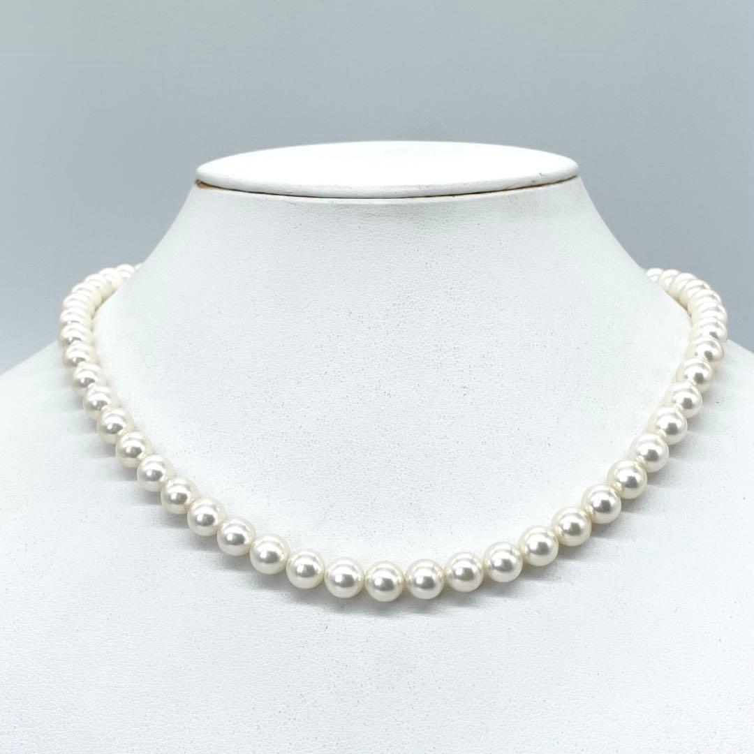 Akoya white pearl necklace with 7 to 7.5 mm pearls on a 43 cm strand featuring a certification tag