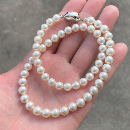 Akoya white pearl necklace with 7 to 7.5 mm pearls on a 43 cm strand featuring a certification tag