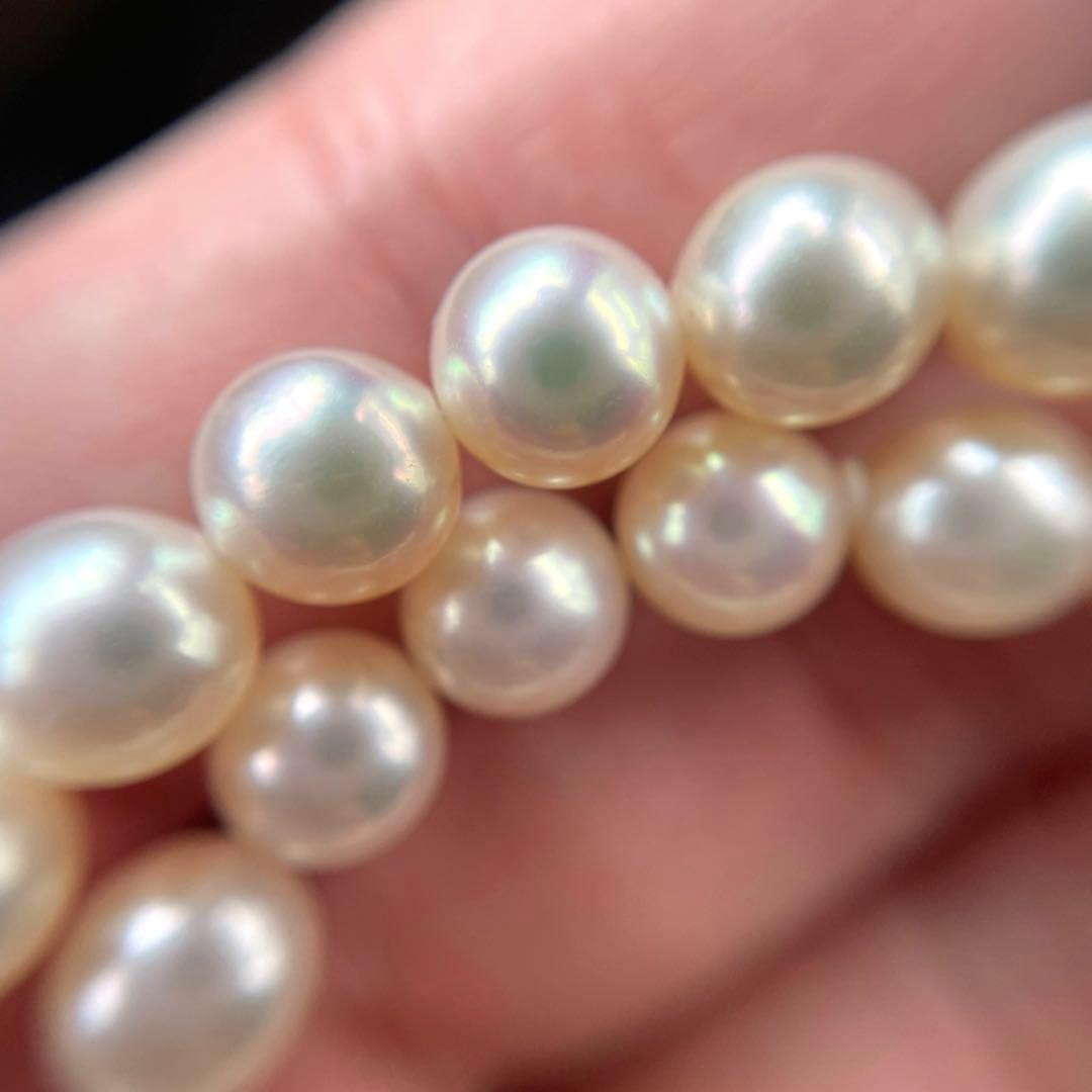 Akoya white pearl necklace with 7 to 7.5 mm pearls on a 43 cm strand featuring a certification tag