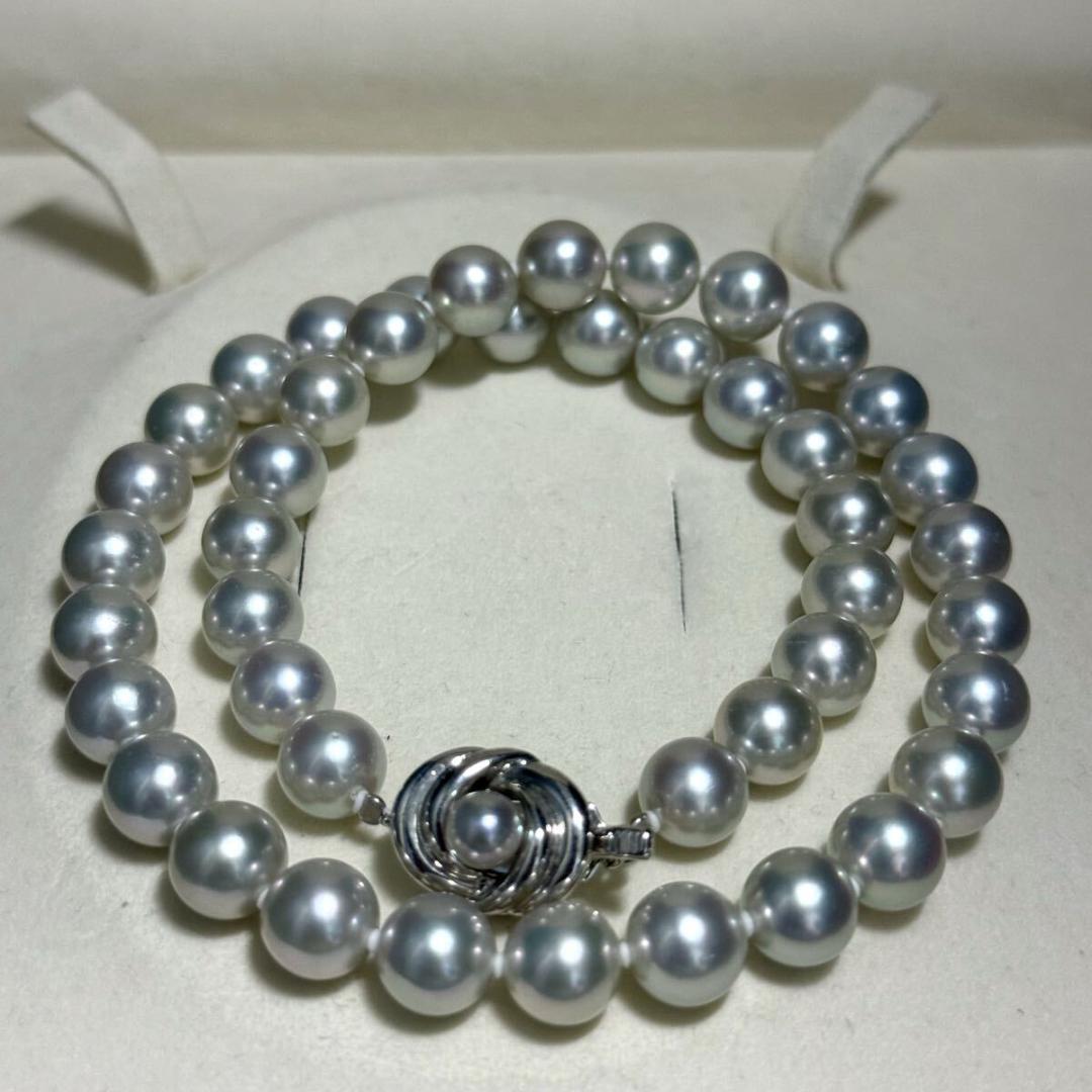 Tasaki Akoya pearl necklace with 8.5-9.0mm pearls and silver clasp on a white background