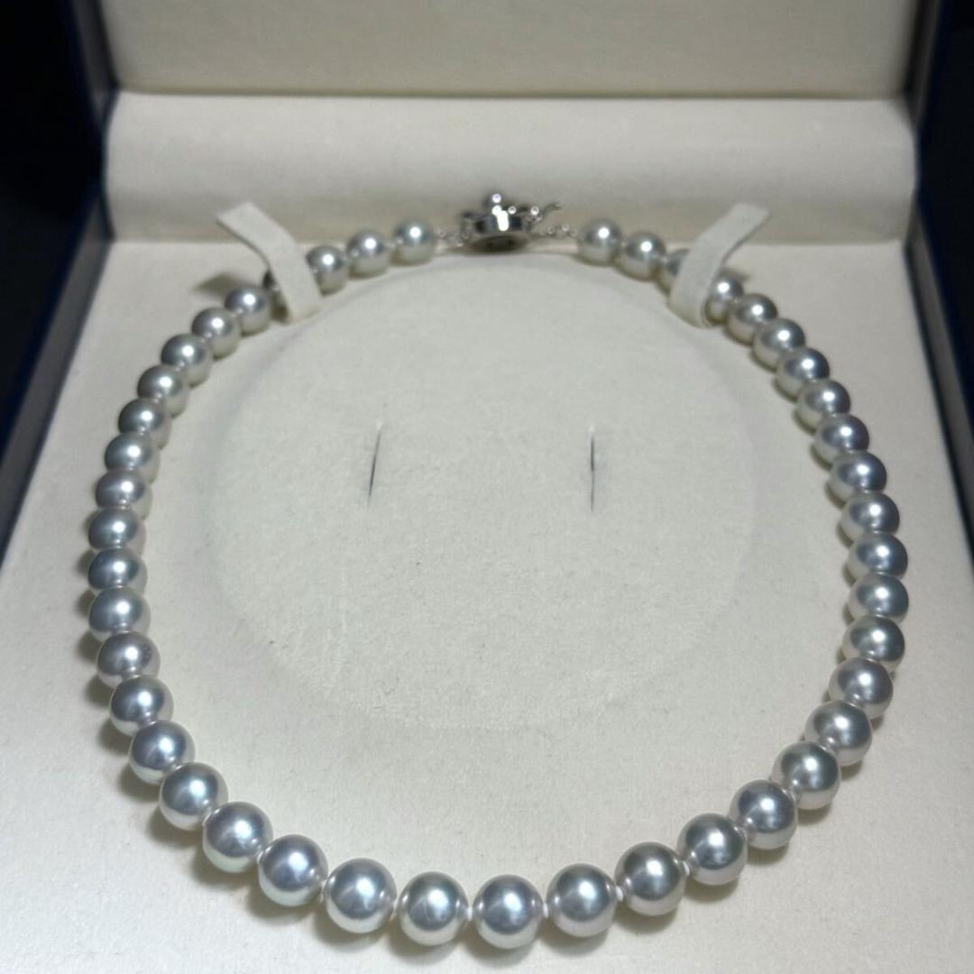 Tasaki Akoya pearl necklace with 8.5-9.0mm pearls and silver clasp on a white background