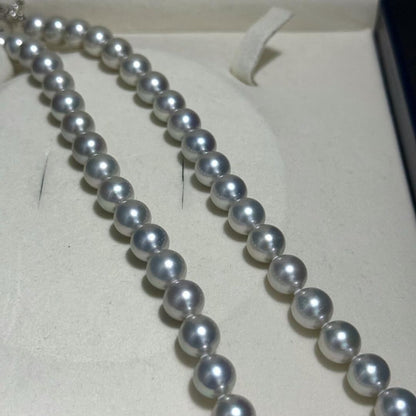 Tasaki Akoya pearl necklace with 8.5-9.0mm pearls and silver clasp on a white background