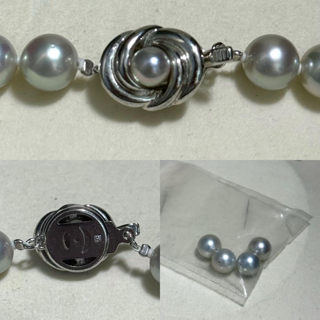 Tasaki Akoya pearl necklace with 8.5-9.0mm pearls and silver clasp on a white background