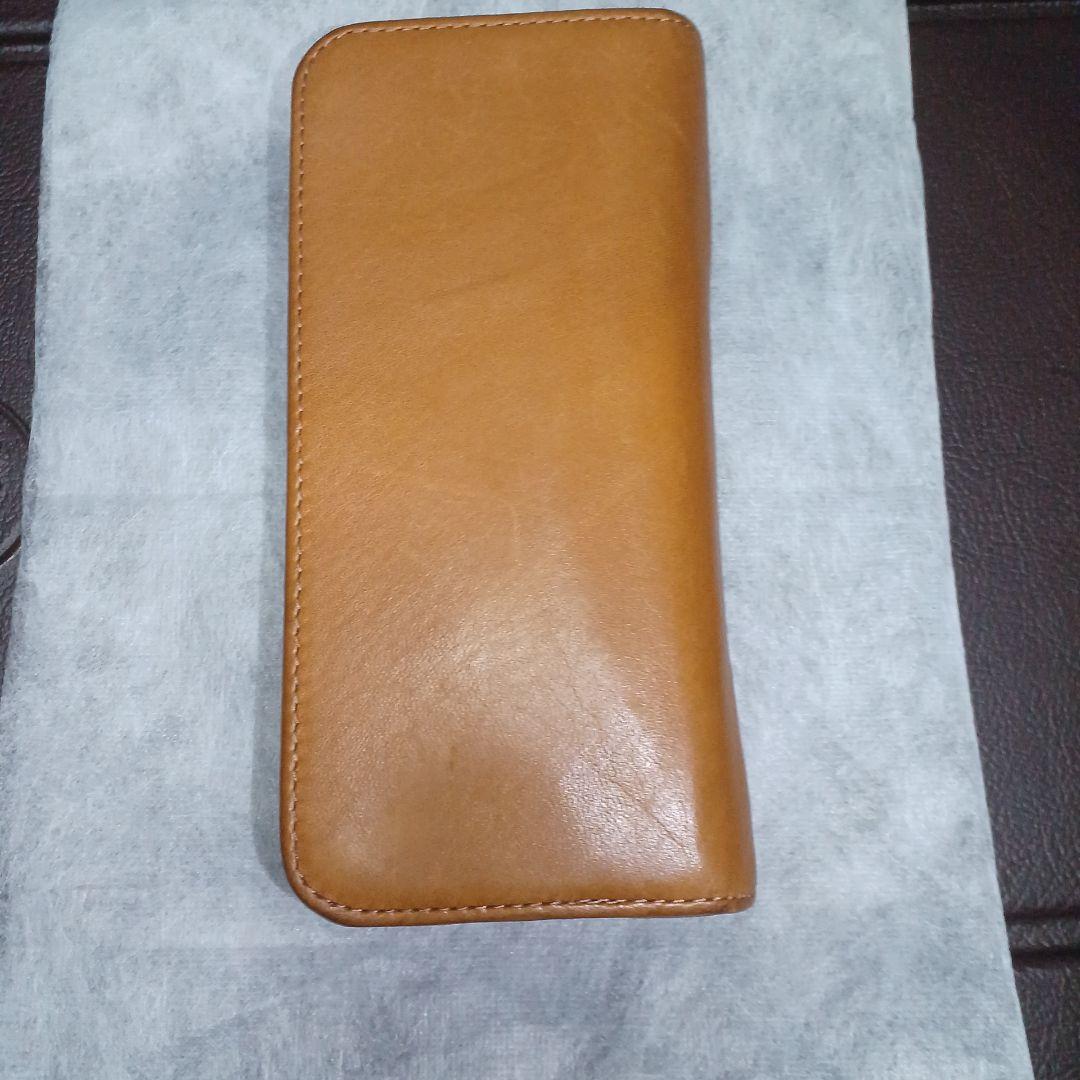 Brown leather Pentsamble Round Zip pen case with zip closure and long wallet design